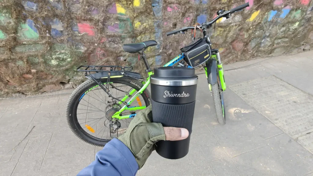 Coffee break during my Sunday cycling ride with my bicycle parked on a quiet street