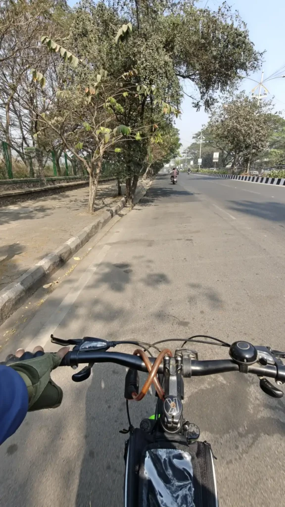 Sunday morning cycling ride on an empty road A quiet morning road during a Sunday cycling ride, captured from a cyclist’s point of view.